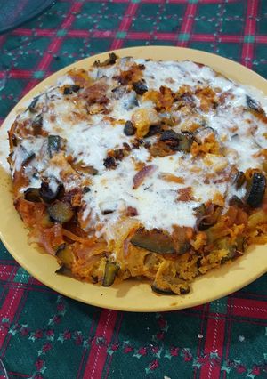 Una foto de Tortilla zapallito cebolla y tomate