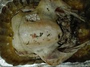 Una foto de pavo relleno con almendras