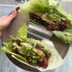 A picture of Korean Black Bean Chicken Lettuce Wraps.