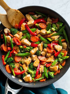A picture of Stir Fry Chicken with Mashed Potatoes.