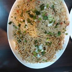A picture of Chicken noodles and fried rice.