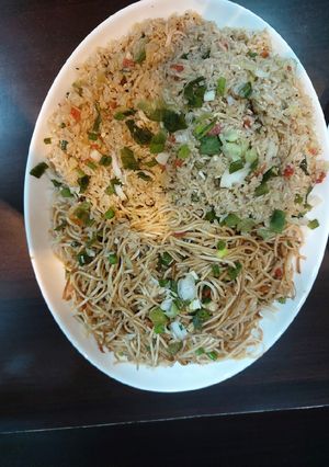 A picture of Chicken noodles and fried rice.