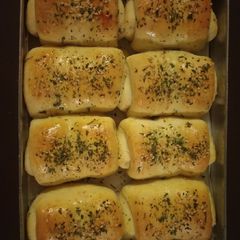 A picture of Pav stuffed with cheese and chicken.