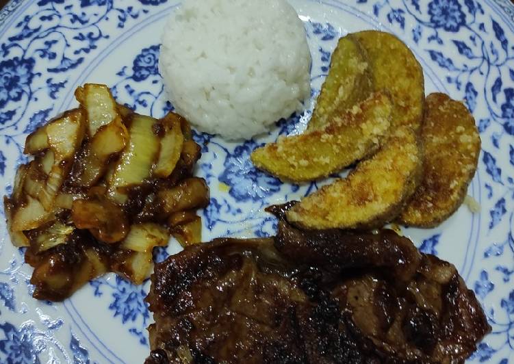 Sirloin steak with onion sautee and fries