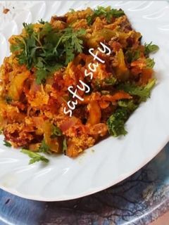 A picture of Shakshuka with Leftover French Fries.