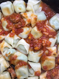Una foto de Pasta casera rellena de brócoli y queso