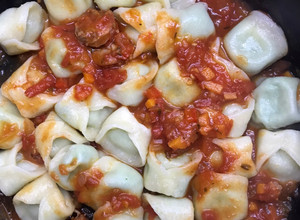 Una foto de Pasta casera rellena de brócoli y queso