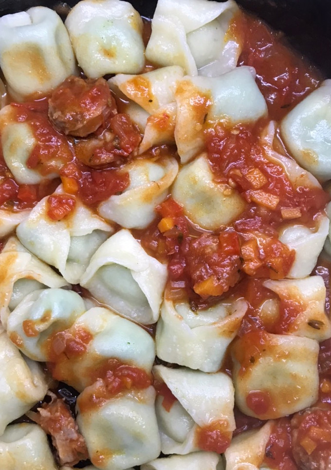 Una foto de Pasta casera rellena de brócoli y queso