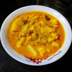A picture of Aloo posto curry.