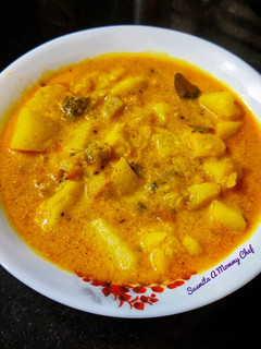 A picture of Aloo posto curry.