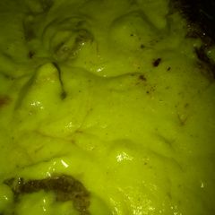 A picture of Curry Chops smothered in curry gravy.