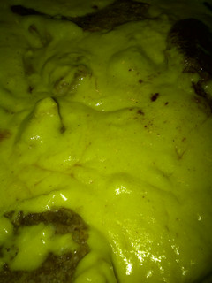 A picture of Curry Chops smothered in curry gravy.