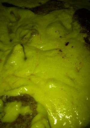 A picture of Curry Chops smothered in curry gravy.