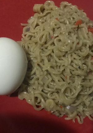A picture of Peppered Noodles and Boiled egg.