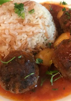 A picture of Meatballs in Tomato Sauce (Kabab Hindi).