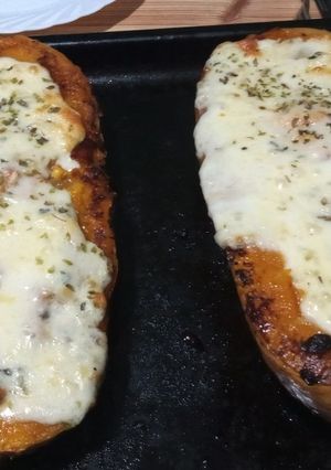 Una foto de Zapallo relleno con verduras, ricota y queso