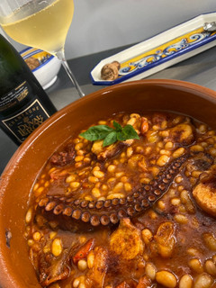 Una foto de Judías blancas con pulpo