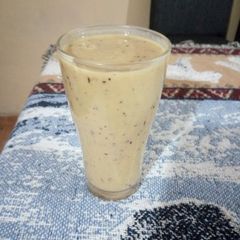A picture of Mango, banana & blueberry smoothie.