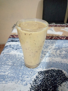 A picture of Mango, banana & blueberry smoothie.