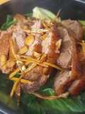 Teriyaki crispy duck over stonepot rice 脆皮鸭煲仔饭