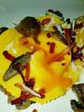 Ravioli with Runny Egg Yolk, Mixed Mushrooms, and Crispy Speck