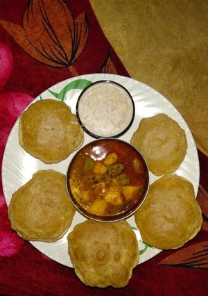 A picture of Puri Sabzi and Sevai.