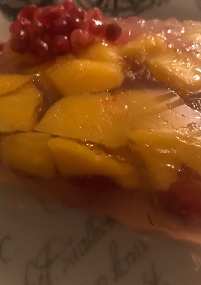 Una foto de Gelatina con frambuesa y mango