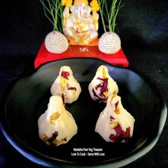A picture of Pista Paneer Rasmalai Mawa Modak.