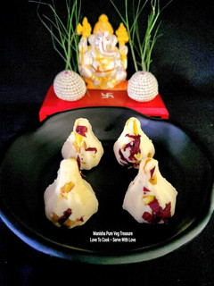 A picture of Pista Paneer Mawa Modak.