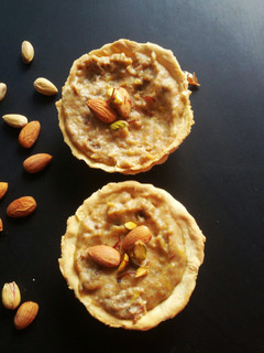 A picture of Bread and mango kheer tart.