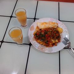 A picture of Sweet potatoes with spinach sauce and poached eggs.