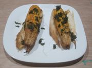 Una foto de elotes al horno