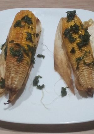 Una foto de Mazorcas de maíz en el horno