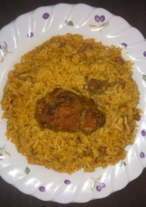 A picture of Jollof rice and beans.