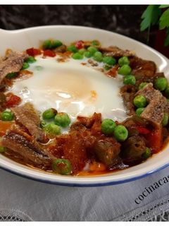 Una foto de Huevos a la flamenca