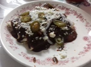Una foto de Enmoladas de tamarindo y pollo