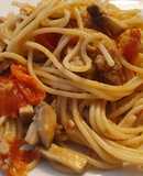 Spaghetti con butifarra y champiñones