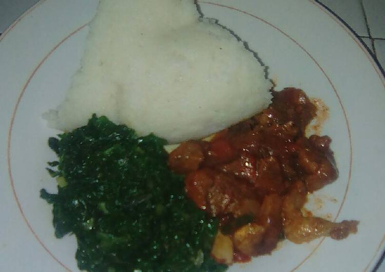 Ugali,fried meat and spinach