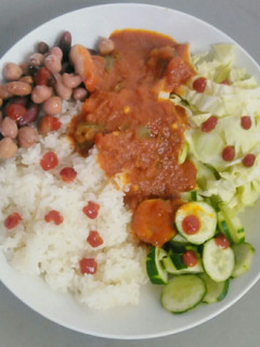 A picture of White rice with cocktail beans and ramen stew.