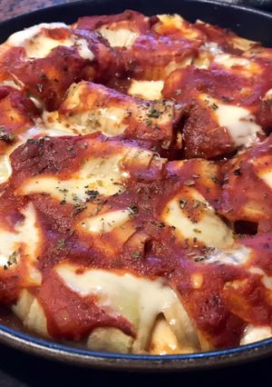 Una foto de Canelones de berenjenas con relleno de pollo y queso