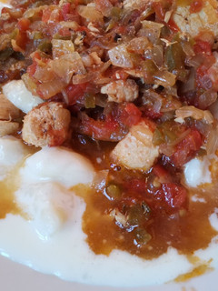 Una foto de Ñoquis con salsa de pollo