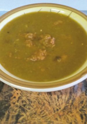 A picture of Red/Green Lentil Soup with Beef Sausage.