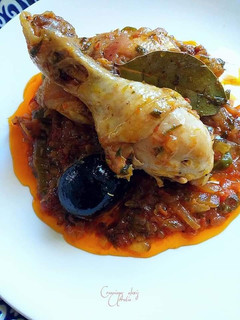 Una foto de Pollo en salsa escabechada agridulce a los aromas de limón negro