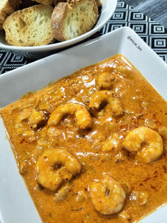 Una foto de Langostinos cremosos al Pedro Ximénez
