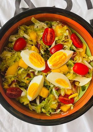 A picture of Mango Salad with Tomatoes and Eggs.
