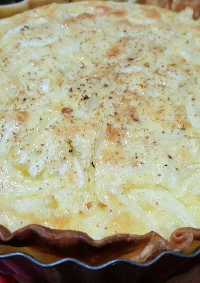 Una foto de Tarta de cebolla y queso fácil rápida y económica
