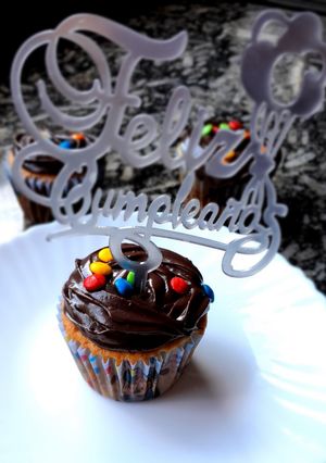 Una foto de Cupcakes decorados ganache de chocolate