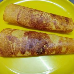A picture of Besan rava paper dosa.