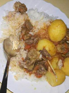 A picture of Boiled Rice, Beef stew with Potatoes.