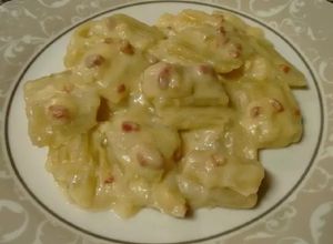 Foto principal de Cardos con bechamel y jamón serrano